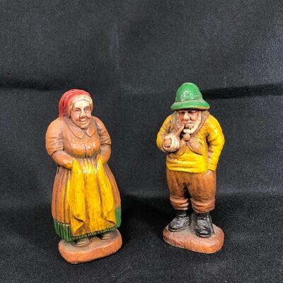 Pair of painted figurines man and woman villagers