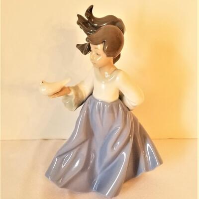 Lot #3  Lladro Figurine - Young girl with bird
