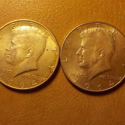 2- 1964 Kennedy Silver half dollars.