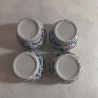 Oriental condiment container