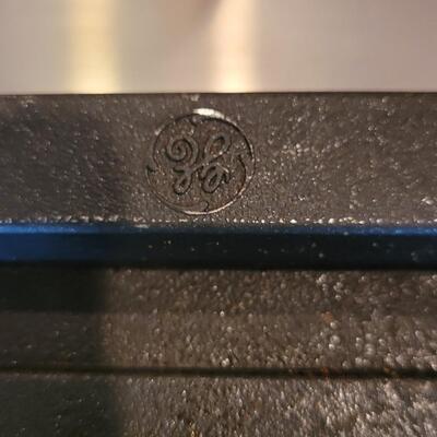 Lot 33: GE Cast Iron Griddle