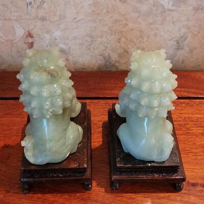 Lot 80: Jadeite Foo Dogs with Stands