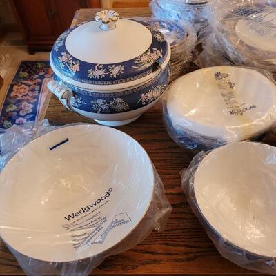 Lot 84: Wedgwood Blue Siam Large China Set (mostly new in packages) 