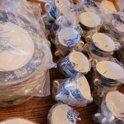 Lot 84: Wedgwood Blue Siam Large China Set (mostly new in packages) 
