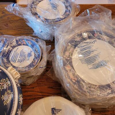 Lot 84: Wedgwood Blue Siam Large China Set (mostly new in packages) 