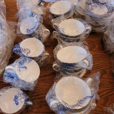 Lot 84: Wedgwood Blue Siam Large China Set (mostly new in packages) 