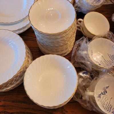 Lot 85: Wedgwood Gold Chelsea (many pieces still New in original packaging)