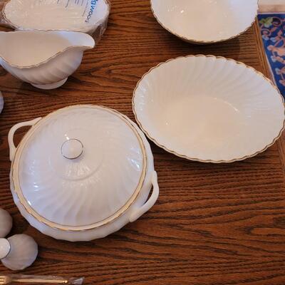 Lot 85: Wedgwood Gold Chelsea (many pieces still New in original packaging)