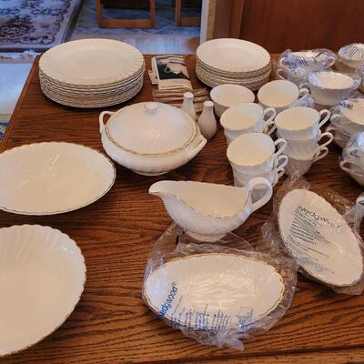 Lot 85: Wedgwood Gold Chelsea (many pieces still New in original packaging)