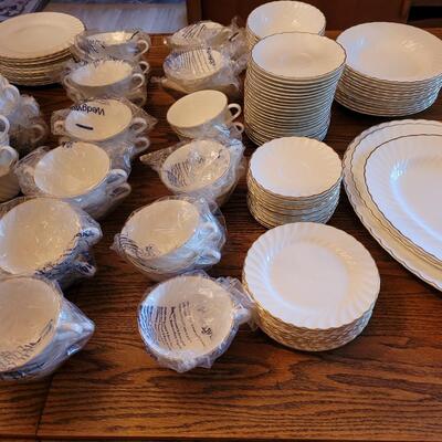 Lot 85: Wedgwood Gold Chelsea (many pieces still New in original packaging)