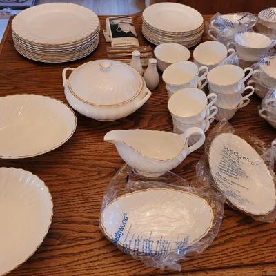 Lot 85: Wedgwood Gold Chelsea (many pieces still New in original packaging)