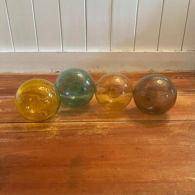 LOT 52 - Four Floating Glass Orbs, Multiple Colors