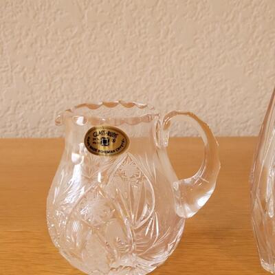 Lot 162: Crystal Fruit Stopper, Creamer Pitcher and Vase