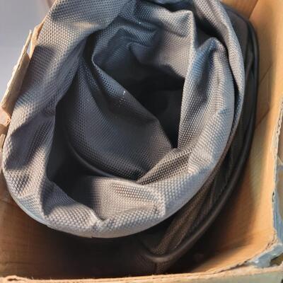 Rolling road trip grill cover bag
