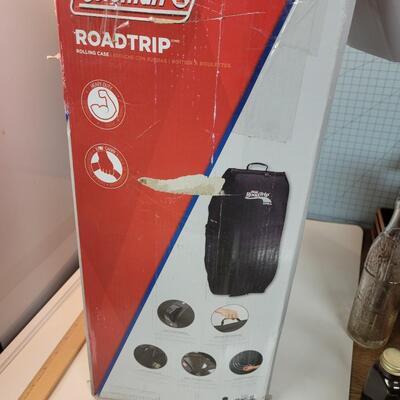 Rolling road trip grill cover bag