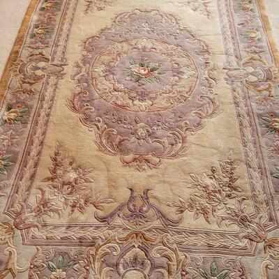 Lot 219: Chinese Area  Rug (has some discoloration)
