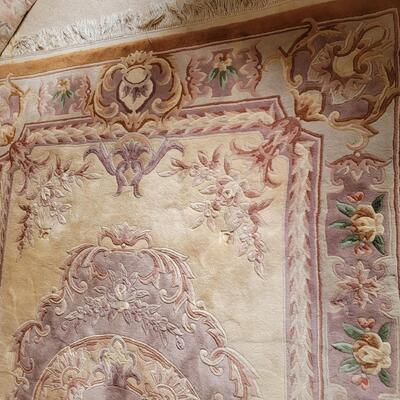 Lot 219: Chinese Area  Rug (has some discoloration)