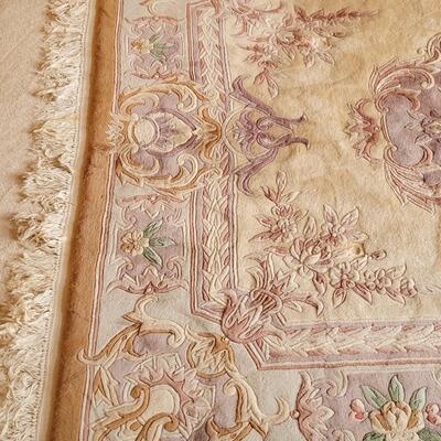 Lot 219: Chinese Area  Rug (has some discoloration)