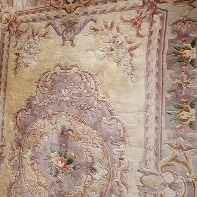 Lot 219: Chinese Area  Rug (has some discoloration)