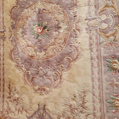 Lot 219: Chinese Area  Rug (has some discoloration)