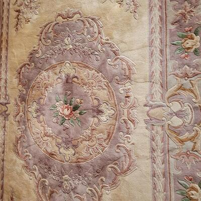 Lot 219: Chinese Area  Rug (has some discoloration)