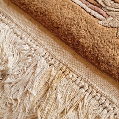 Lot 219: Chinese Area  Rug (has some discoloration)