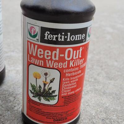 Lot 266: (2) Full Bottles of Weed Out
