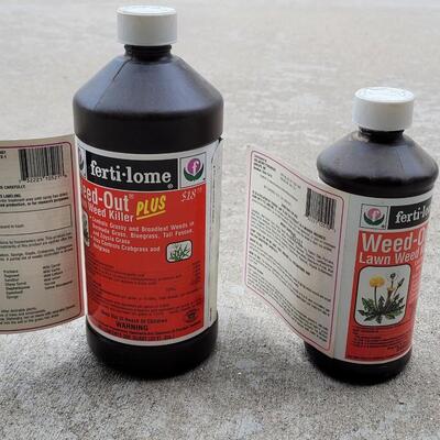 Lot 266: (2) Full Bottles of Weed Out