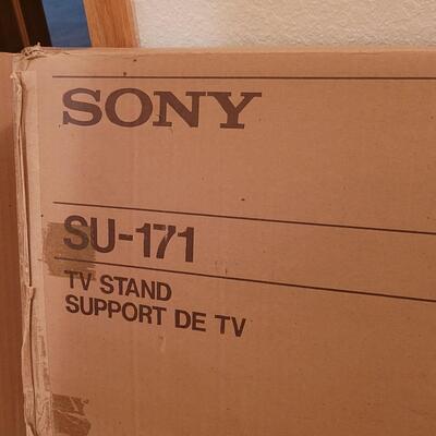 Lot 312: Sony TV Stand in the box 