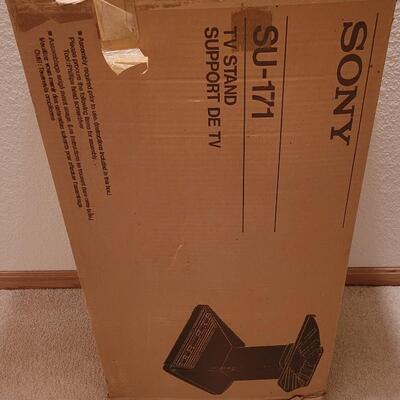 Lot 312: Sony TV Stand in the box 