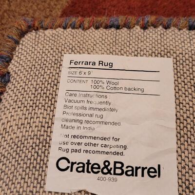 Lot 362: Crate & Barrel Area Rug (has indents from furniture)