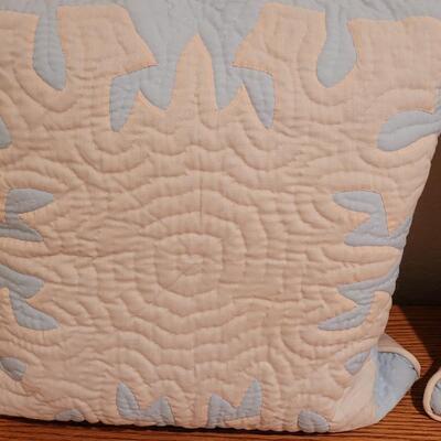 Lot 367: (2) Hawaiian Quilted Blue & Pink Back Pillows (have some discoloration)
