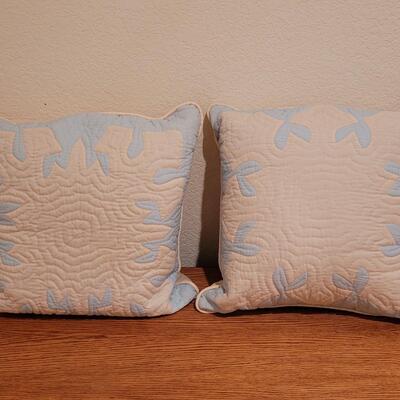 Lot 367: (2) Hawaiian Quilted Blue & Pink Back Pillows (have some discoloration)