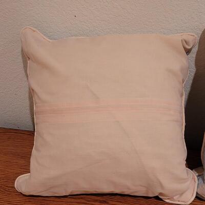 Lot 367: (2) Hawaiian Quilted Blue & Pink Back Pillows (have some discoloration)