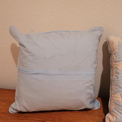 Lot 368: Hawaiian Quilted Pink & Blue Back Pillows (have some discoloration)
