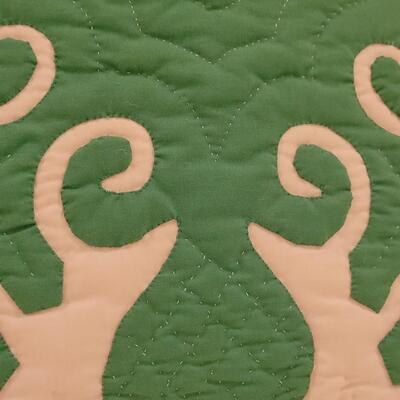 Lot 372: Hawaiian Green and White Quilted Pillow 