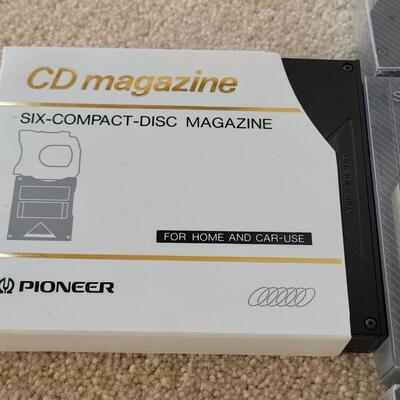 Lot 396: Pioneer PD-M500 CD Player and CD Magazine Cartridges 