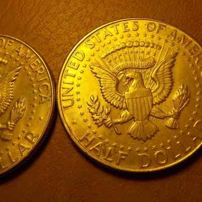 2- Kennedy 1954 silver coins.