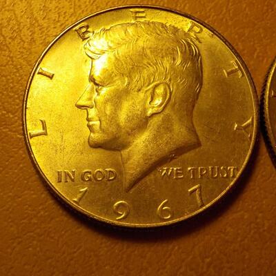 2- 1967 silver Kennedy half dollar.