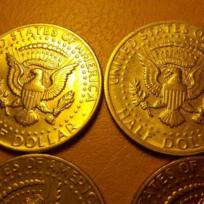 6- Kennedy half dollars 1973,74,79,72.