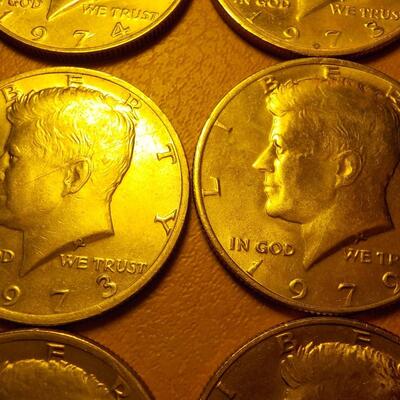 6- Kennedy half dollars 1973,74,79,72.