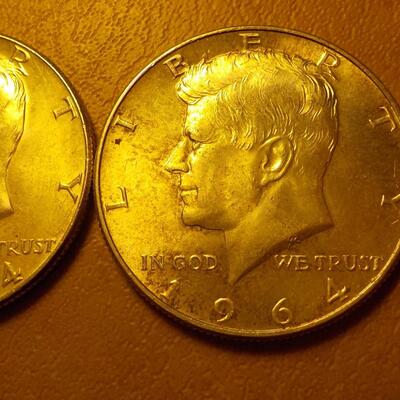 2- 1964 Kennedy Silver half dollars.