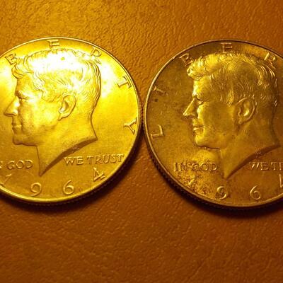 2- 1964 Kennedy Silver half dollars.