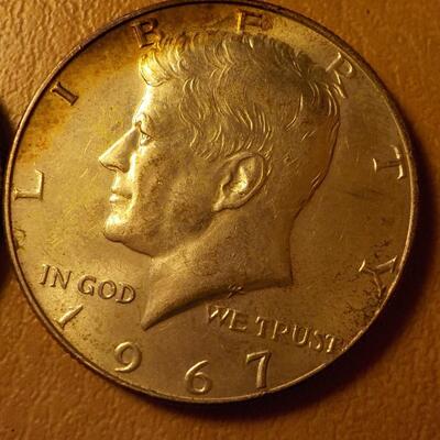 1968 and 1967 Kennedy silver half dollars.
