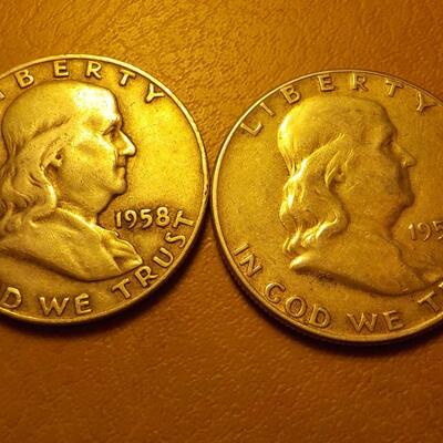 1958 and 1951 Benjamin silver half dollars.