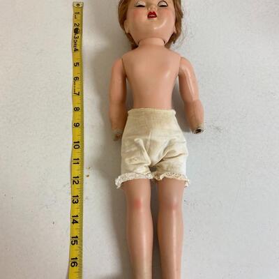 Vintage hard plastic doll, 17 inchs tall with lace knickers.