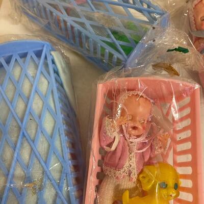 Lot of 3 vintage plastic babies in cradles