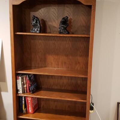 Two tall book shelves 