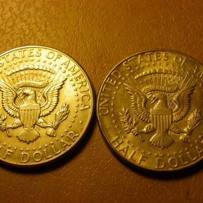 2- 1964 Kennedy Silver half dollars.