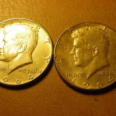 2- 1964 Kennedy Silver half dollars.